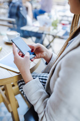 Woman Typing on Phone