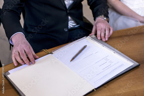 Marriage Elegant Groom Signing German Wedding Register Holding Pen Marriage Elegant Groom Signing German Wedding Register Holding Pen And Official Doent
