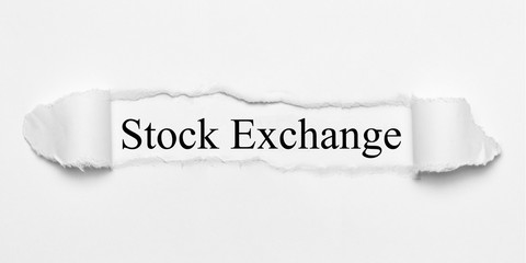 Stock Exchange on white torn paper
