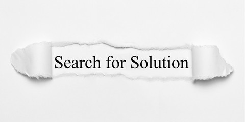 Search for Solution on white torn paper