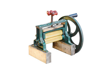Old Grinder squid machine for Sugar cane and Dry squid made from cast iron and brass on white background with clipping path