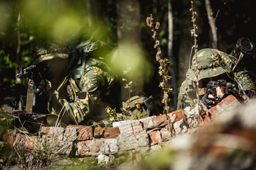 Military men with submachine gun