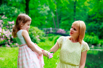 Young mother and little girl have a rest