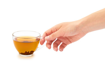 Female hand holds a cup of tea. Isolated on white background