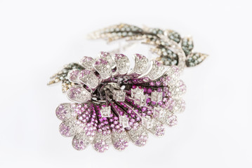 flower brooch on white background