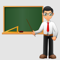 Young friendly teacher standing in classroom