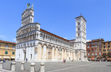 Basilica San Michele in Foro, Roman Catholic church in Lucca, Tuscany, central Italy, built over ancient Roman forum - obrazy, fototapety, plakaty