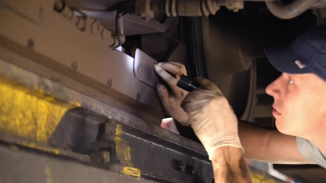 a man repairing a train