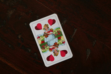 playing card on the wooden table