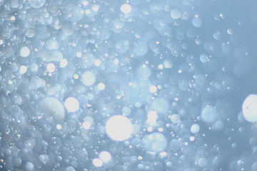 A beautiful and blurry bokeh on a blue background.