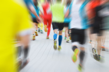 Motion blurred runners at the marathon