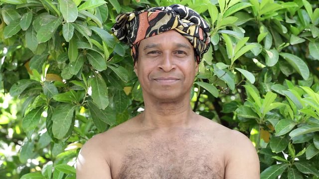 Portrait of smiling man wearing traditional Brazilian clothing