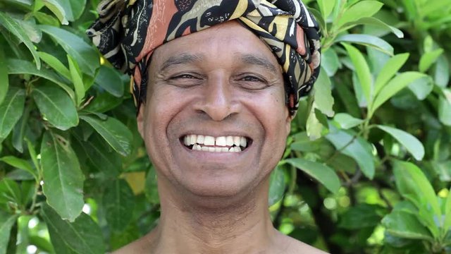Portrait of laughing man wearing traditional Brazilian clothing
