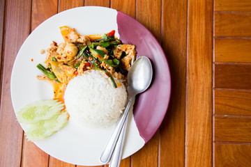 Rice topped with stir-fried pork and basil