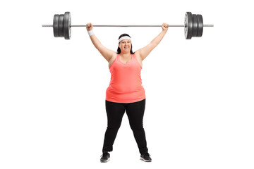 Fototapeta na wymiar Overweight woman lifting a barbell