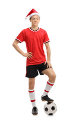 Teenage soccer player wearing a Christmas hat