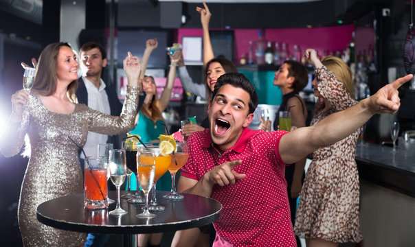 Young Student Guy Is Dancing On Party