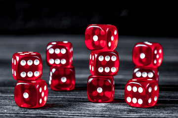 concept luck - dice gambling on dark wooden background