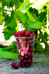 Cherries on wooden table
