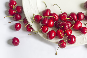Naklejka na ściany i meble cherries on white background