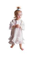 Cute small baby girl in hand made lace dress walking on white background