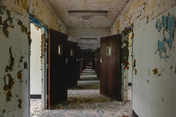 Abandoned Hallway with Doors in Old Hospital - New York
