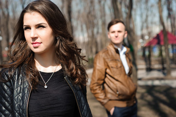 Portrait of young couple in love in a park