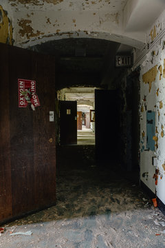 Abandoned Dark Hallway with Doors in Old Hospital - New York