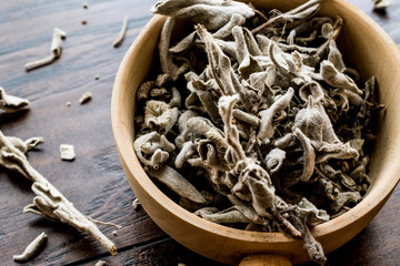 Dry Sage Tea in wooden ladle