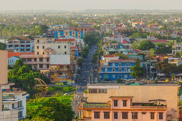 Obraz premium Traffic and buildings and crowded houses in Danang City, Hue City, Vietnam Taken from high angle down.