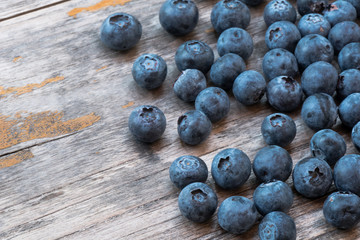 Ripe blackberries on plank