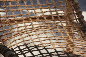 Coir - Natural cocos fibre ropes connected to a grid 