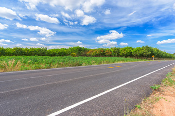 Fototapeta premium Asphalt road and countryside views