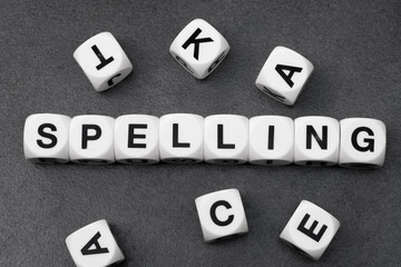 Obraz premium word spelling on toy cubes