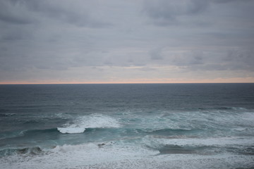 Fototapeta premium El mar, el Sol escondido y las olas