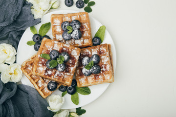 Belgian waffles with blueberries for breakfast