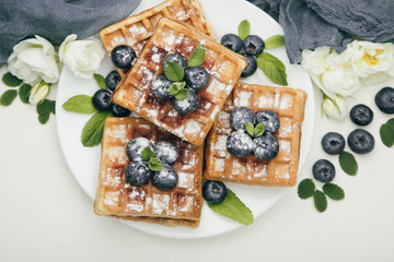 Belgian waffles with blueberries for breakfast