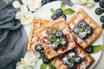 Belgian waffles with blueberries for breakfast
