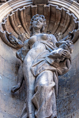 Fototapeta na wymiar Woman statue at the Royal Palace (Buda Castle). Castle Hill District (Varhegy), Buda, Budapest, Hungary.