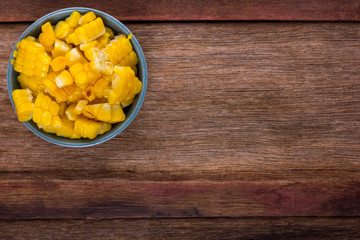 split corn on wood background