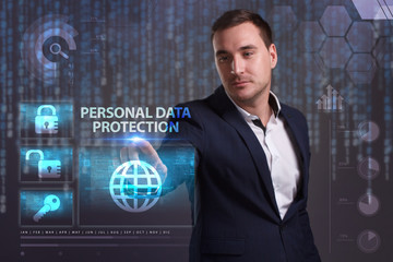 The concept of business, technology, the Internet and the network. A young entrepreneur working on a virtual screen of the future and sees the inscription: Personal data protection