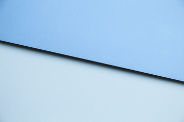 Light blue and blue color paper background