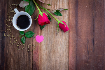 red roses on wooden Board
