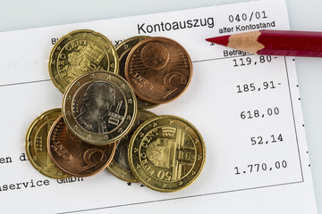 bank statement and coins