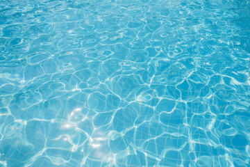 Plakat Blue and bright water surface and ripple wave in swimming pool