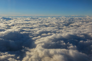 Naklejka na ściany i meble flying above the clouds. view from the airplane