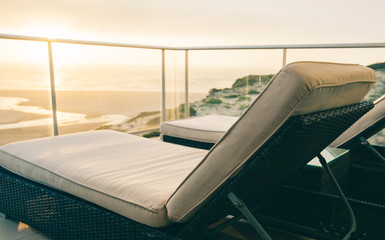 Luxury hotel terrace with amazing sunset view . Balcony relax. 