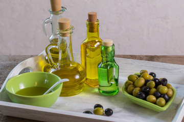 Olive oil  on the wooden table