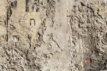 old wall background with vintage letters