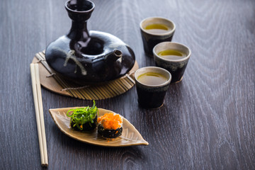 tea set and sushi